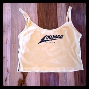 Lᴏs Aɴɢᴇʟᴇs ʏᴇʟʟᴏᴡ ᴄʀᴏᴘ ᴛᴏᴘ sʟɪɢʜᴛʟʏ ᴡᴏʀɴ